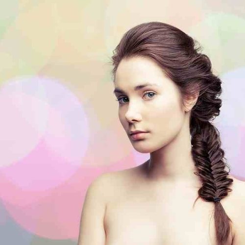 Girl with a long fishtail braid