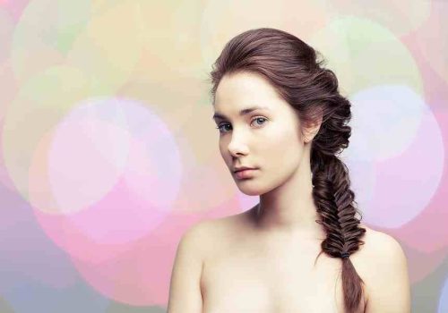 Girl with a long fishtail braid