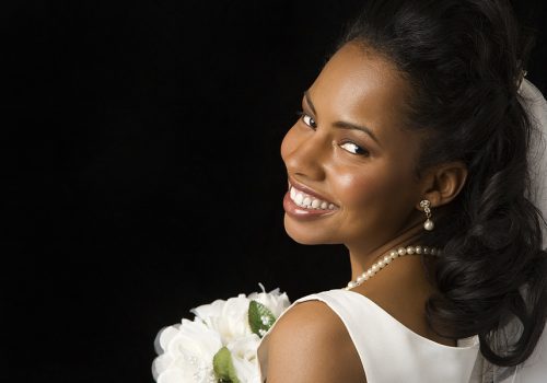 Simple wedding bridal hairstyle with curls and veil