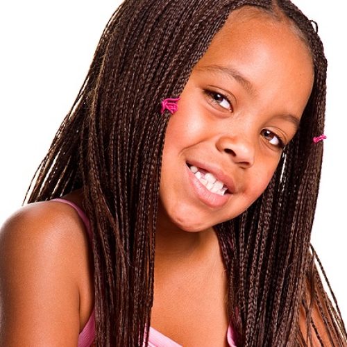 Smiling little African American girl with micro braids 2