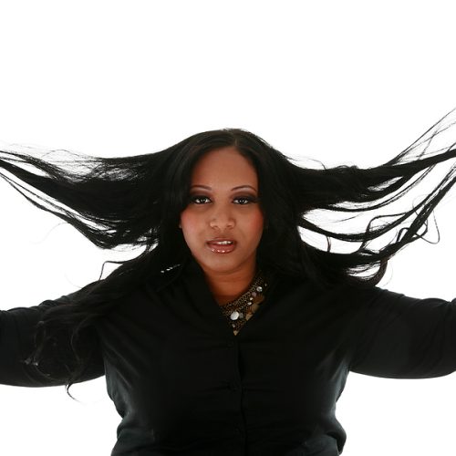 Woman holding her hair extensions