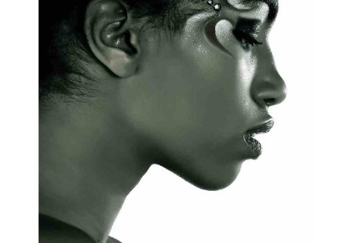 Woman with short hair and unique make up