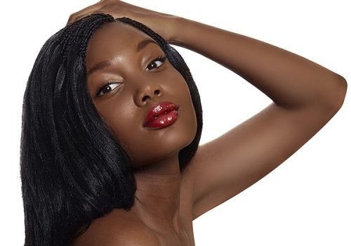 woman touching her weave
